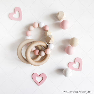 WM STOCK PHOTO Mums & Bubs Baby Girl Wooden Rings & Bead Rattle Pink Hearts All Around 5846 Square Size
